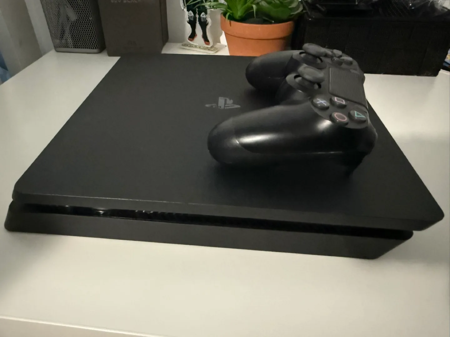 PS4 Slim Console with Black Controller image indicator(5)