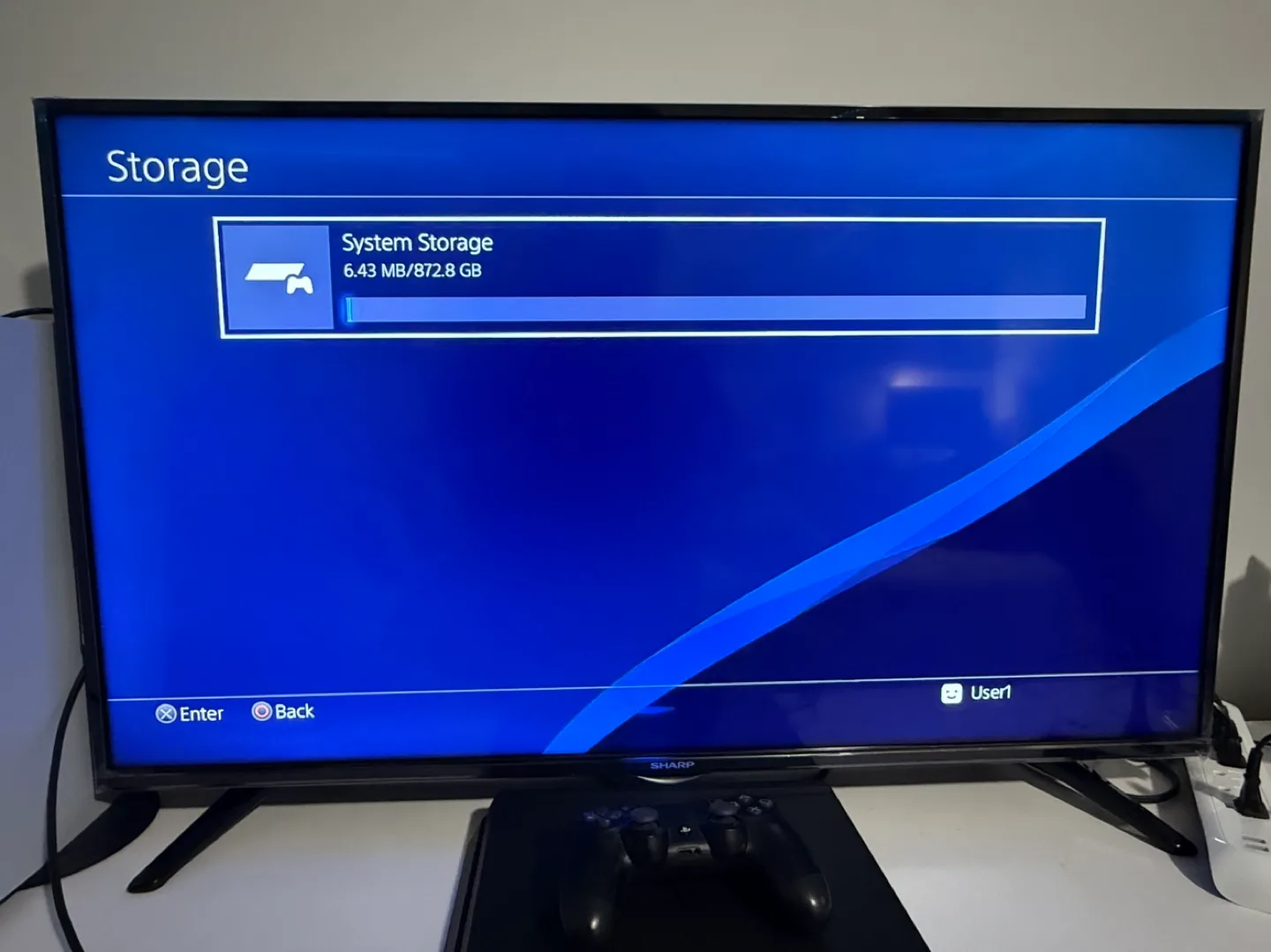 PS4 Slim Console with Black Controller image indicator(7)