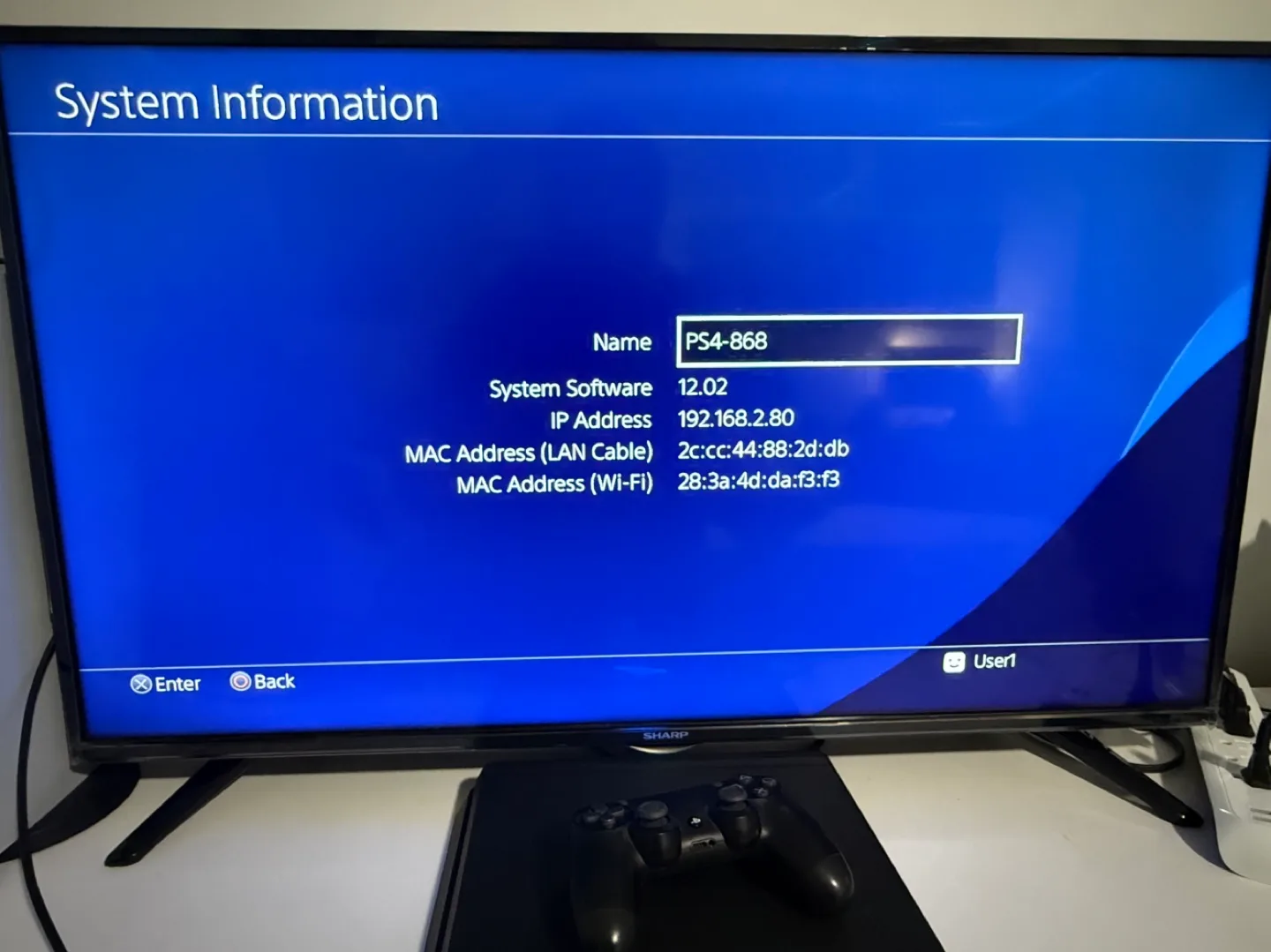 PS4 Slim Console with Black Controller image indicator(8)