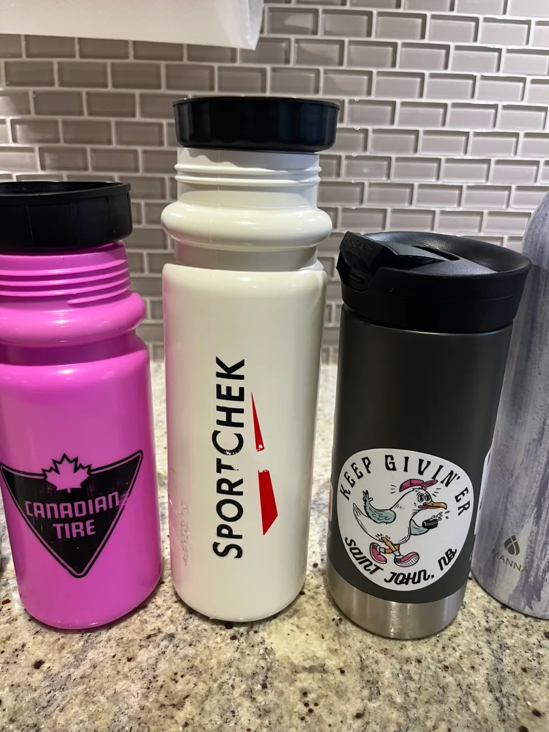 Five Assorted Water Bottles and Travel Mug image indicator(3)