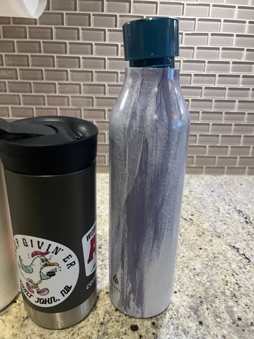 Five Assorted Water Bottles and Travel Mug image indicator(4)