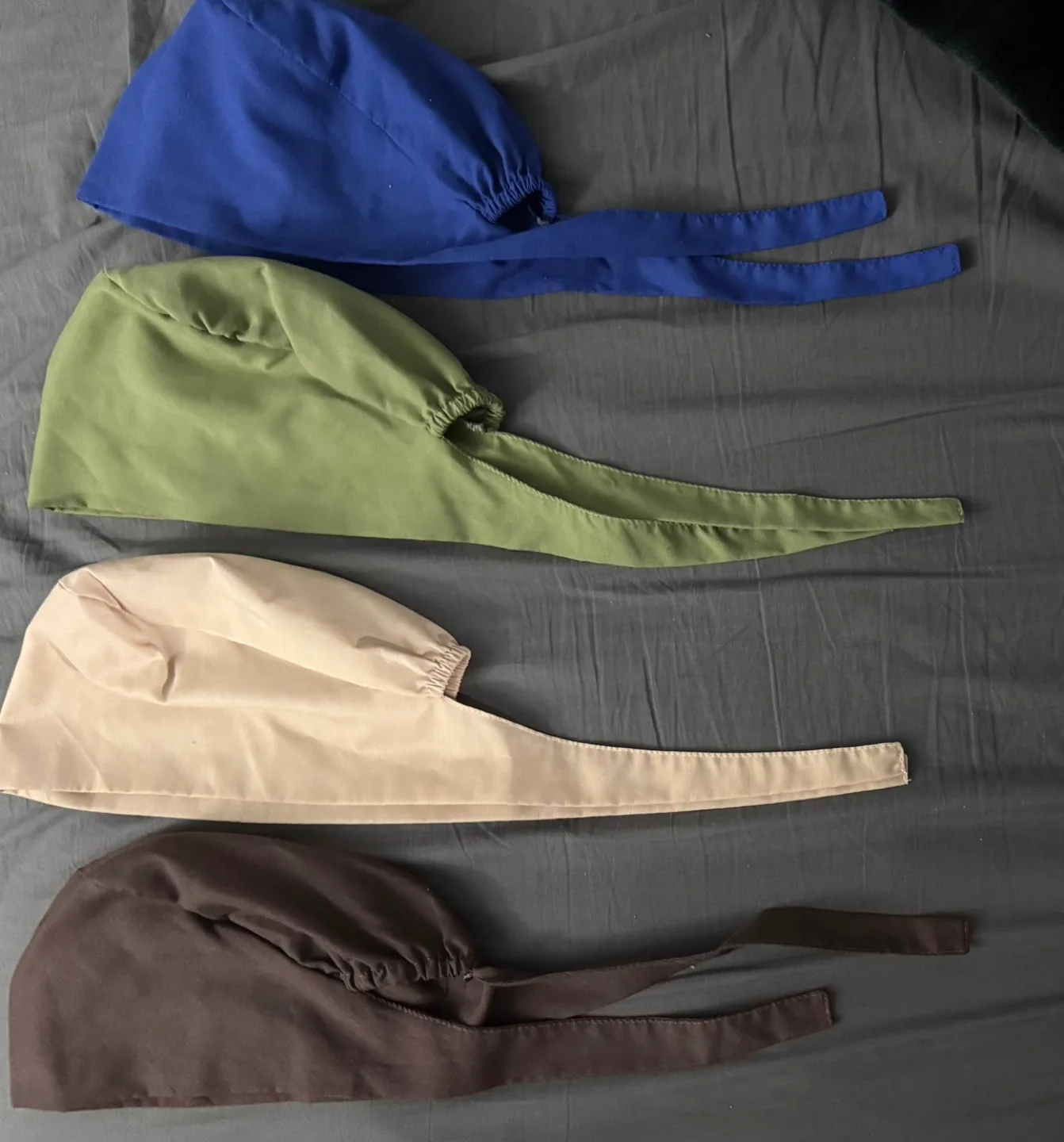 Bulk lot of scrub caps - various colours image indicator(4)