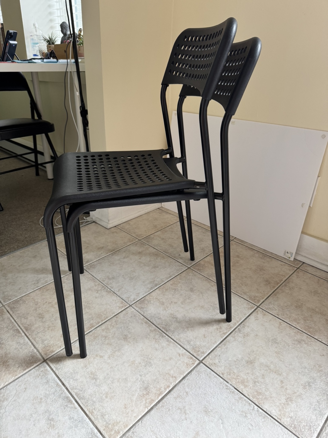 Pair of Black Plastic Chairs - photo 2