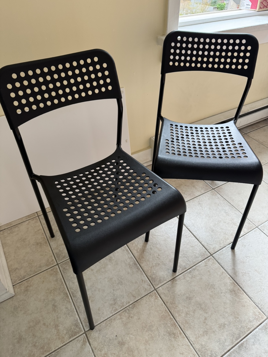 Pair of Black Plastic Chairs