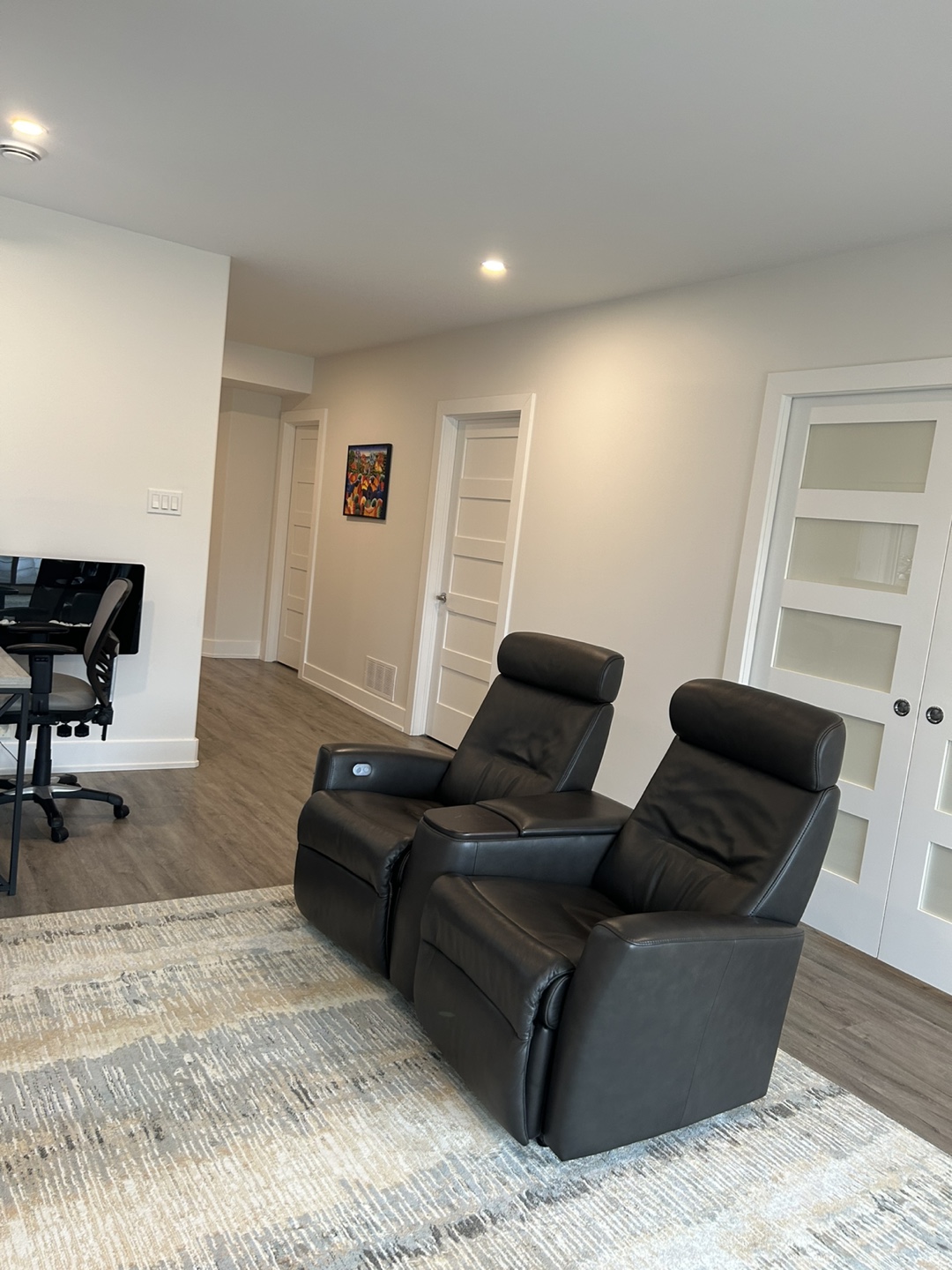 Upper Room Pair of Black Leather Recliners