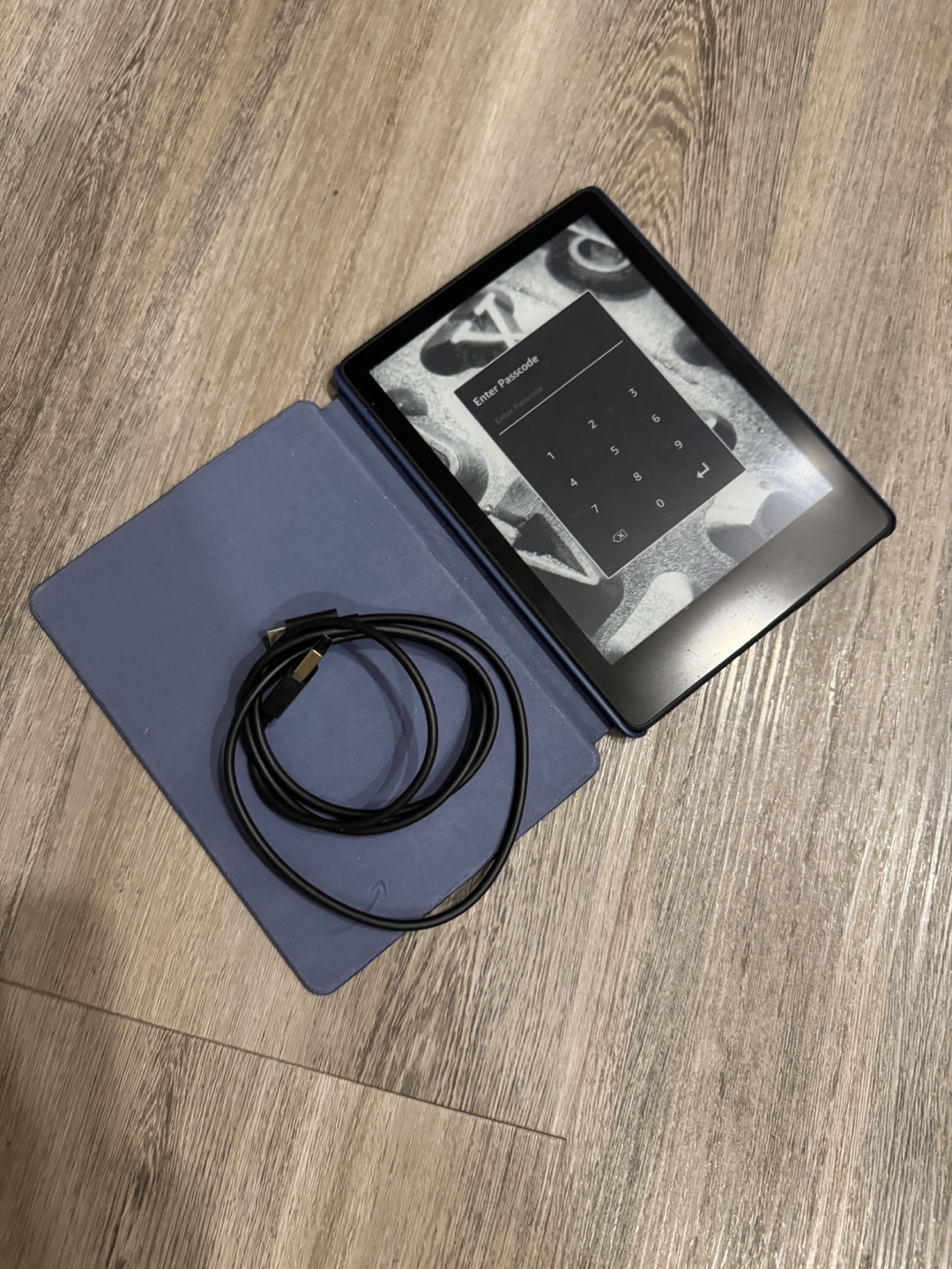 Kindle e-reader with case and cable