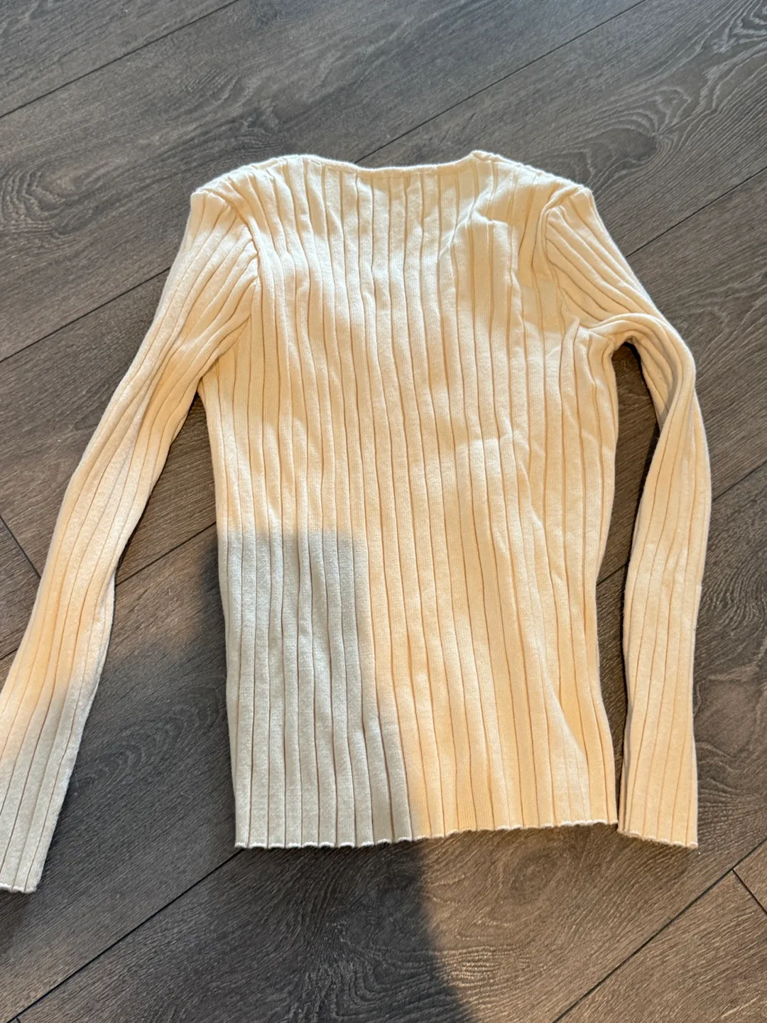Cream-coloured ribbed knit top image indicator(2)