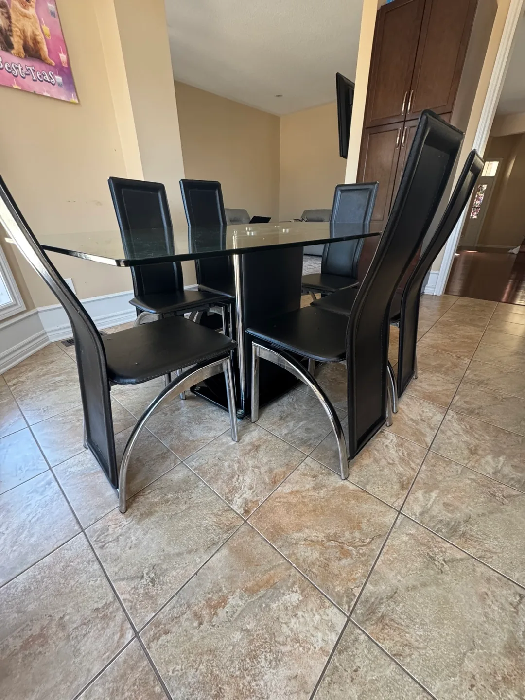Glass top dining table with six chairs