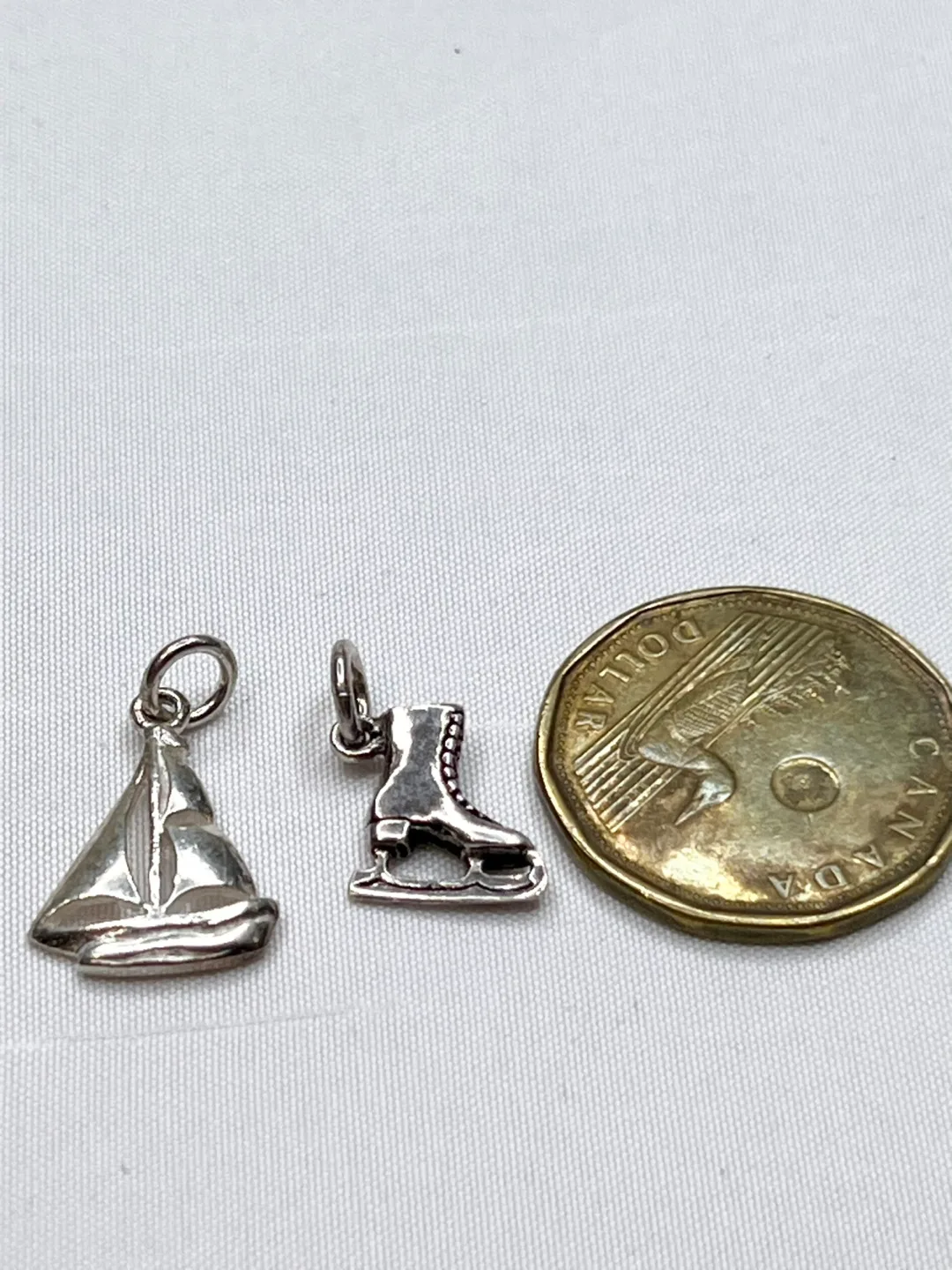 Vintage Silver sailboat and ice skate charms charm bracelet image indicator(2)