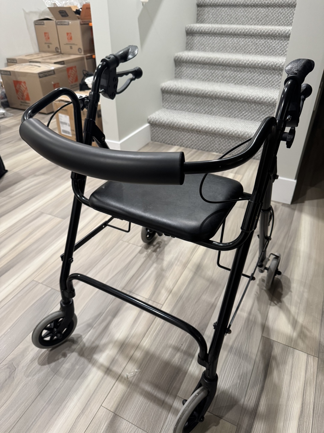 Black Rollator Walker with Padded Handlebars