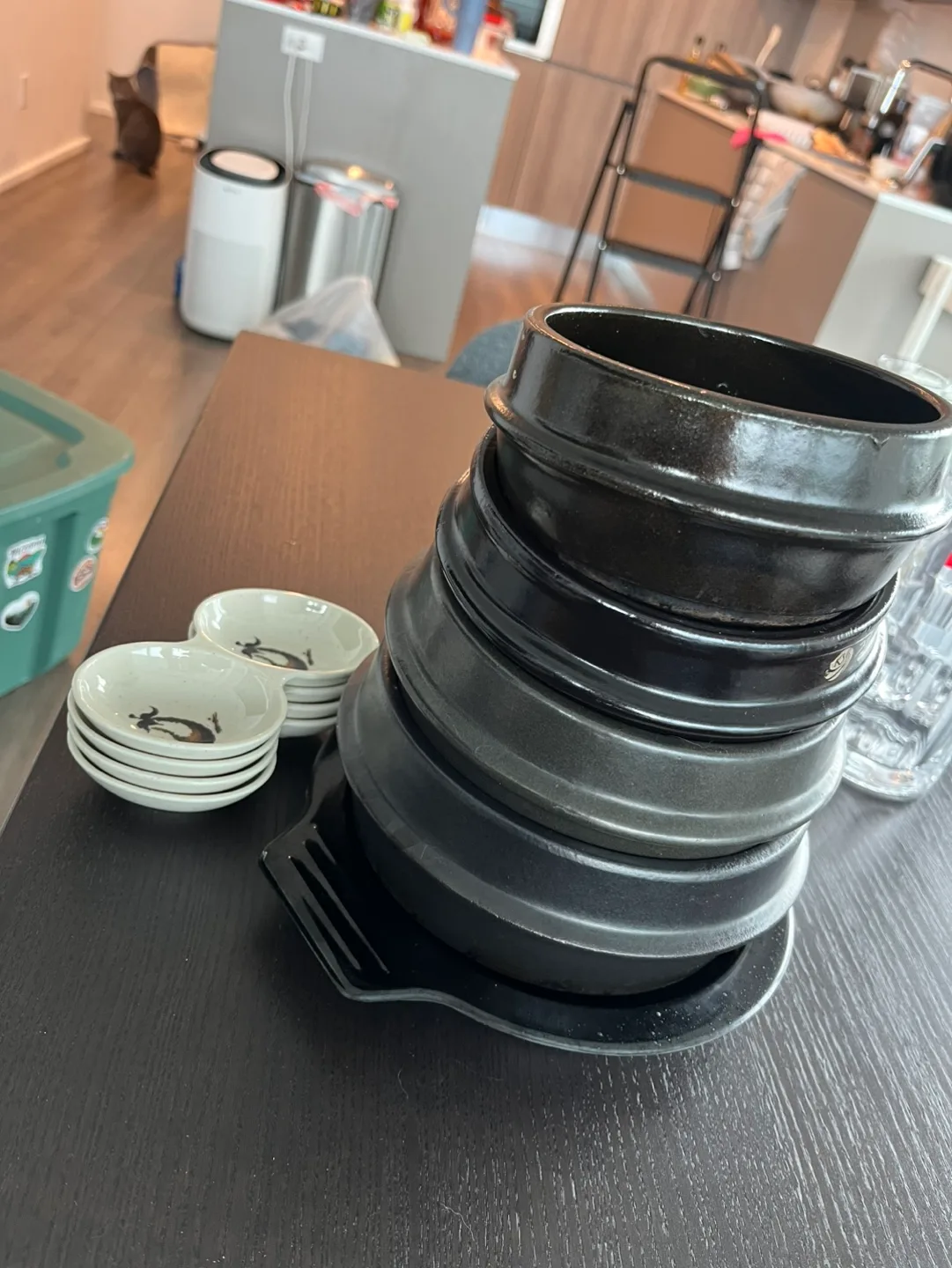 Stack of Black Stoneware Bowls with Small Dishes thumbnail