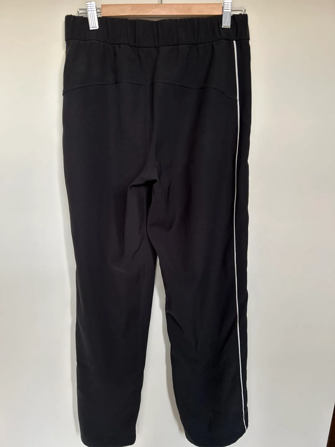 Lululemon Black Track Pants with White Side Stripes - Size 8 image indicator(2)