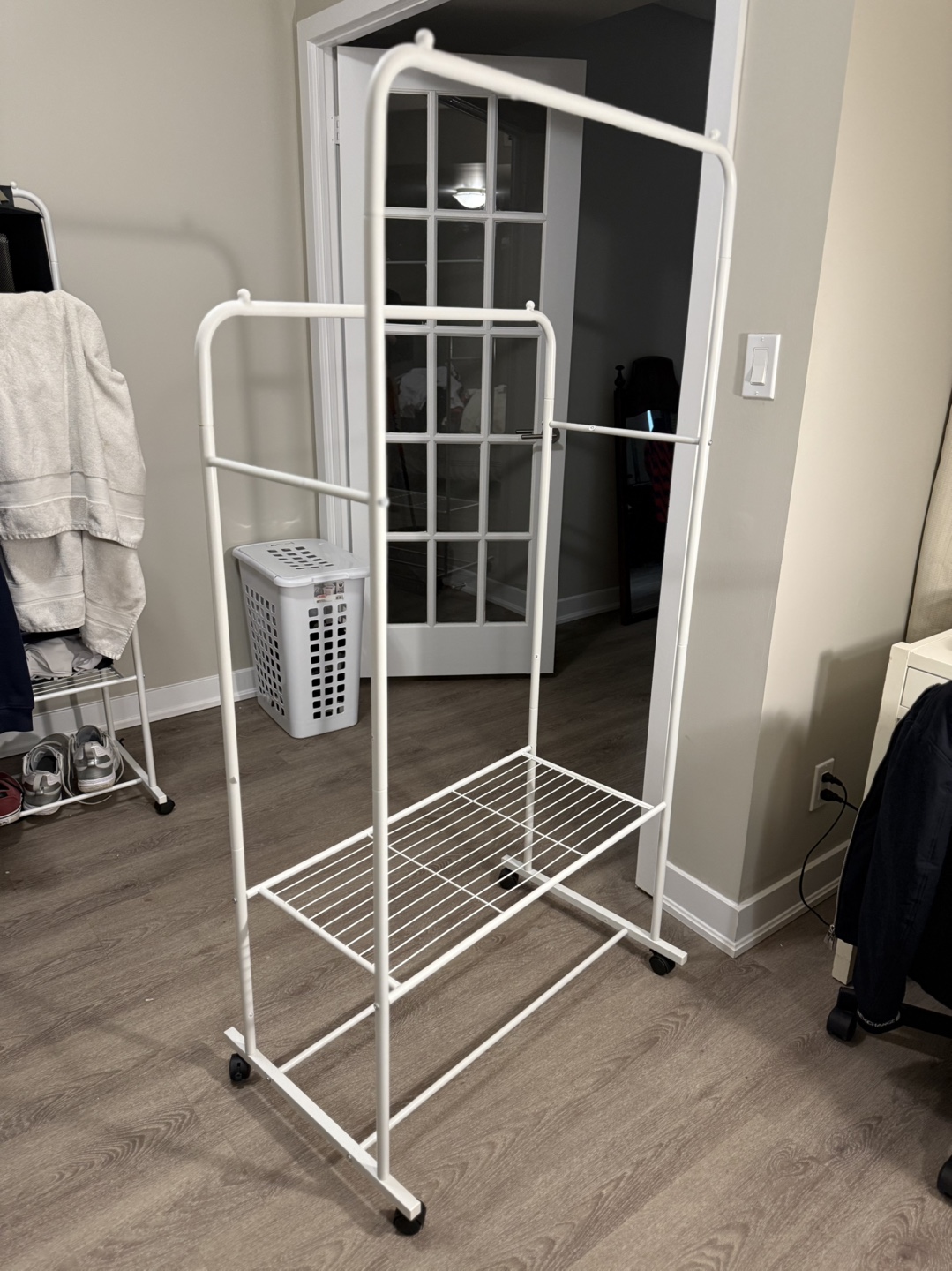 White Metal Clothing Rack with Shelf and Wheels