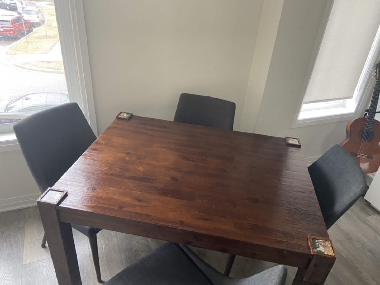 Four-Chair Dining Set with Unique Tabletop Accents
