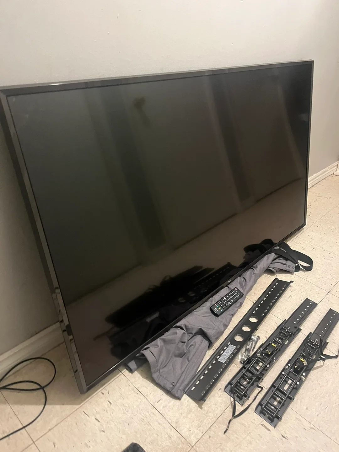 LG 65” 4K smart tv and wall mount image indicator(3)
