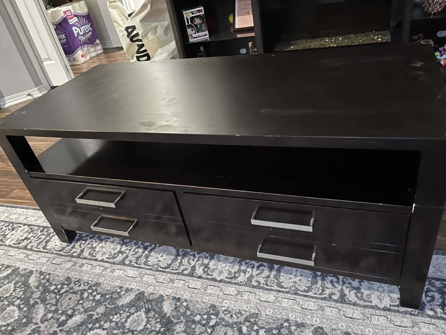 Dark brown media coffee table with drawers