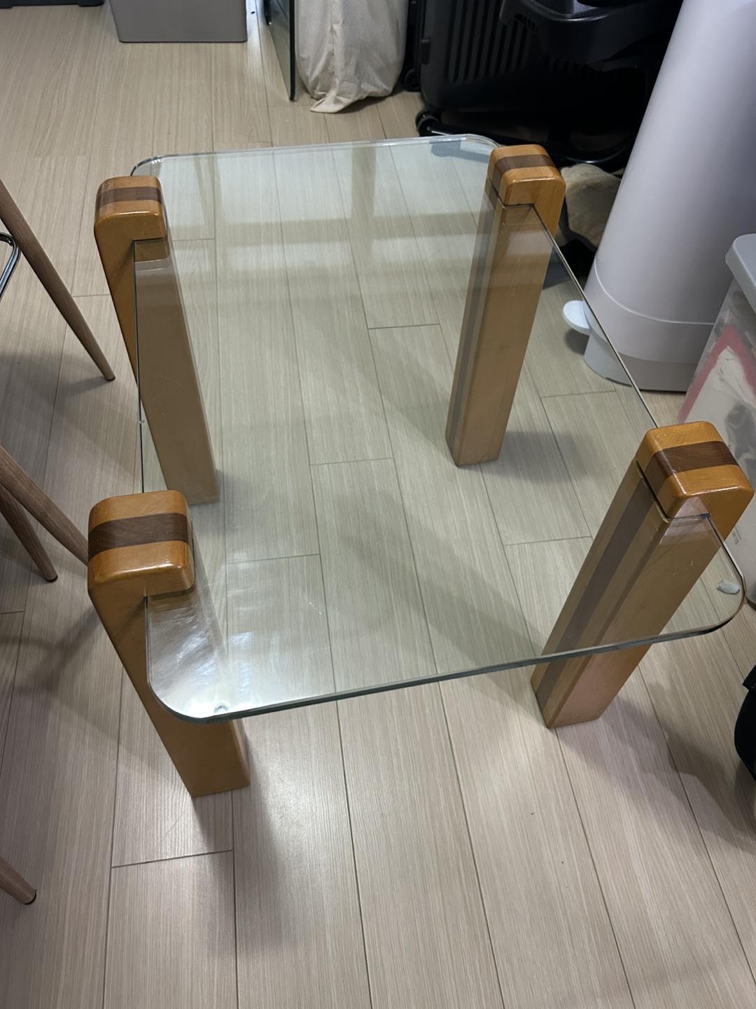 2 Glass top coffee table with wooden legs