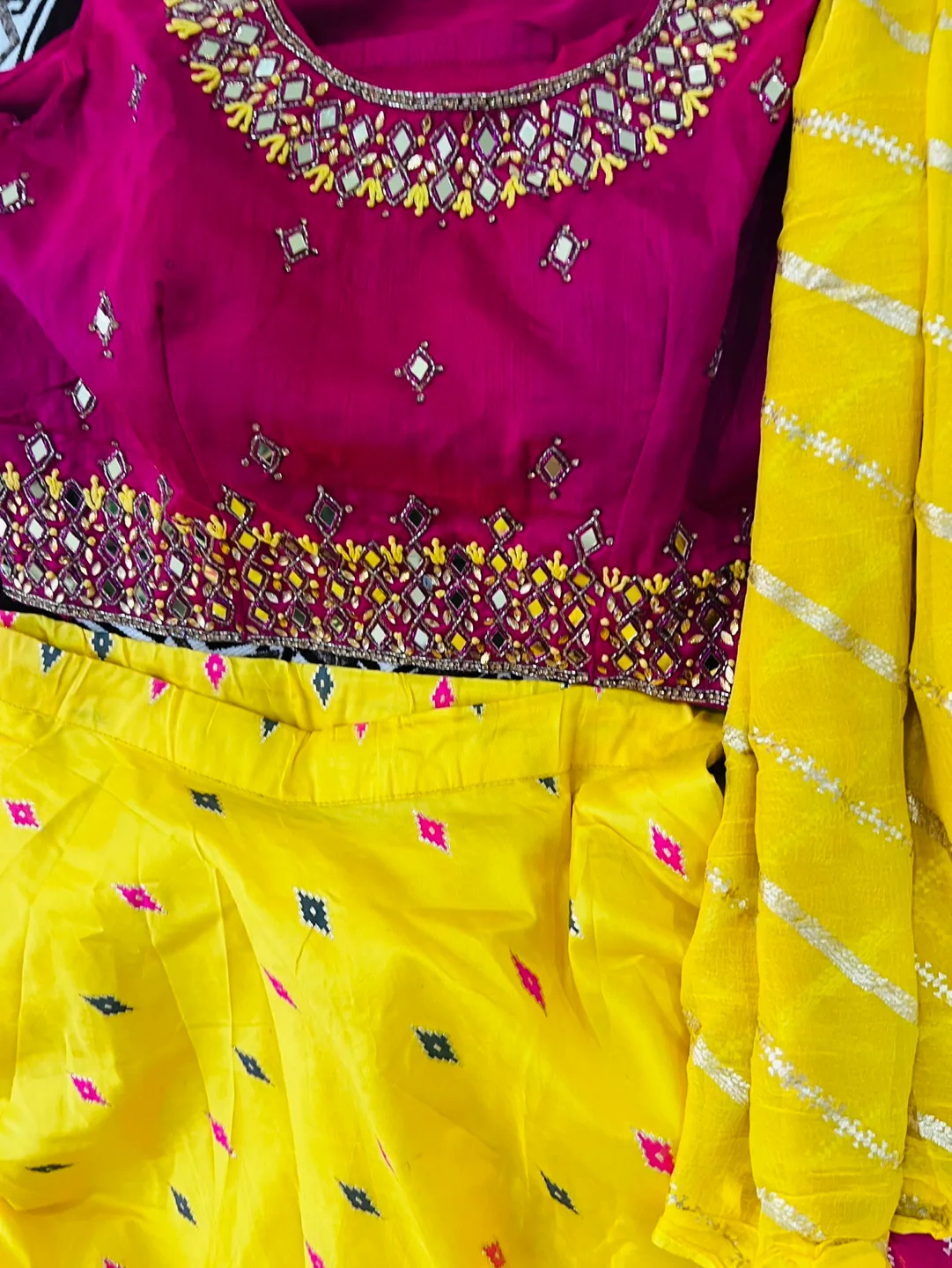 Beautiful Yellow and Pink Embroidered Choli and Lehenga Set image indicator(5)