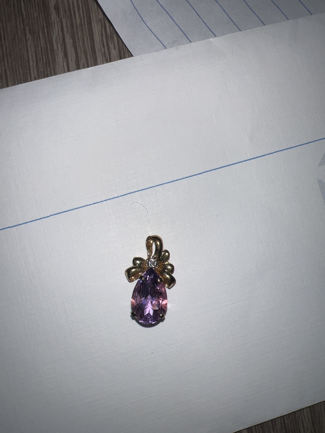 Amethyst Pendant with Gold Bow Accent