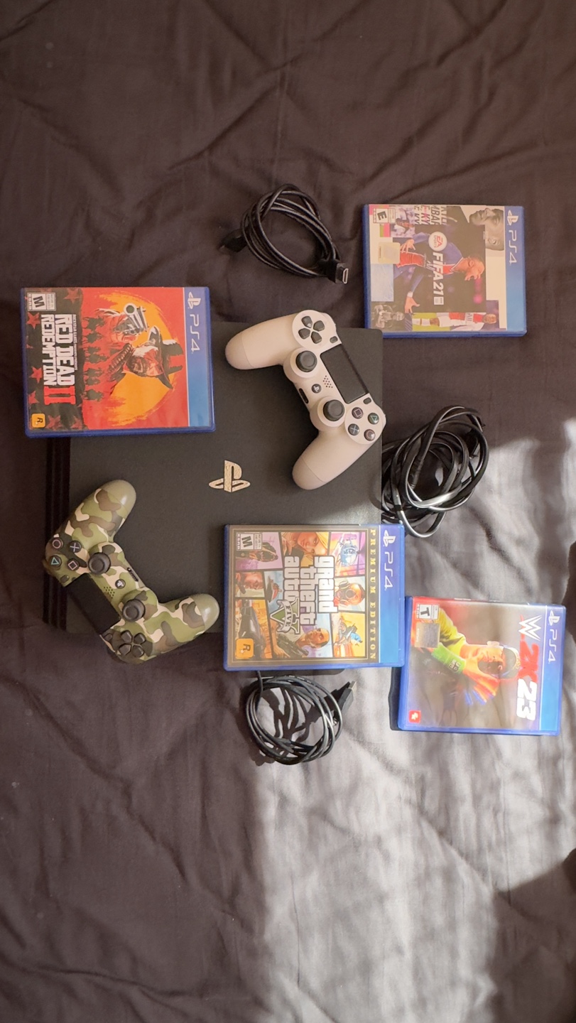 PS4 Slim Console Bundle with 12 Games and Accessories