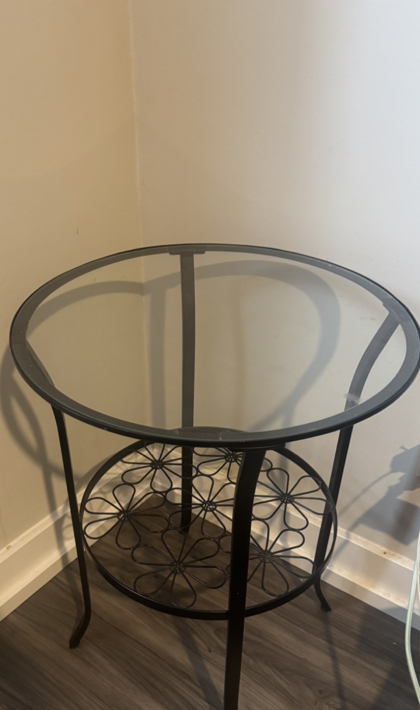 Glass-top side table with metal frame