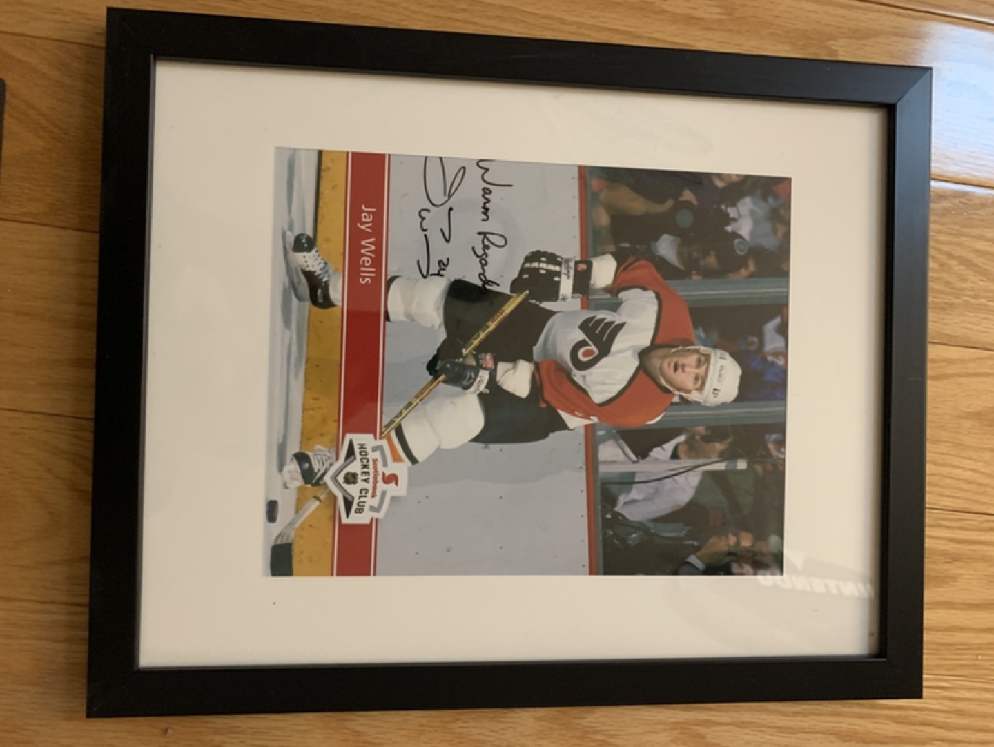 Framed autographed Jay Wells hockey photo