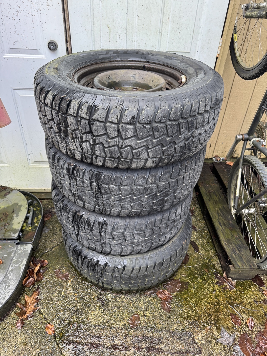 Four Used Winter Tires on Steel Rims - 265/70R17
