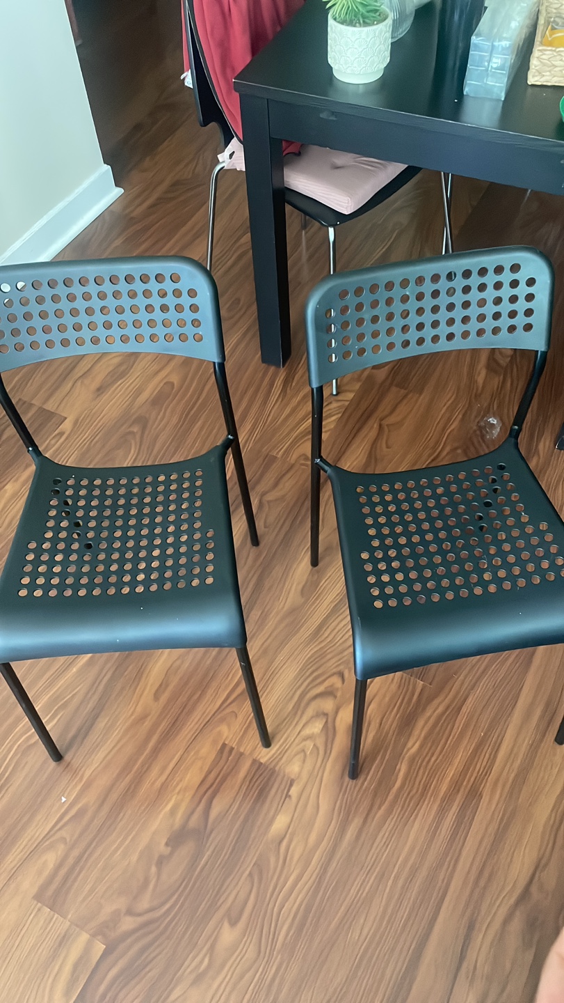 Pair of Black Plastic Chairs