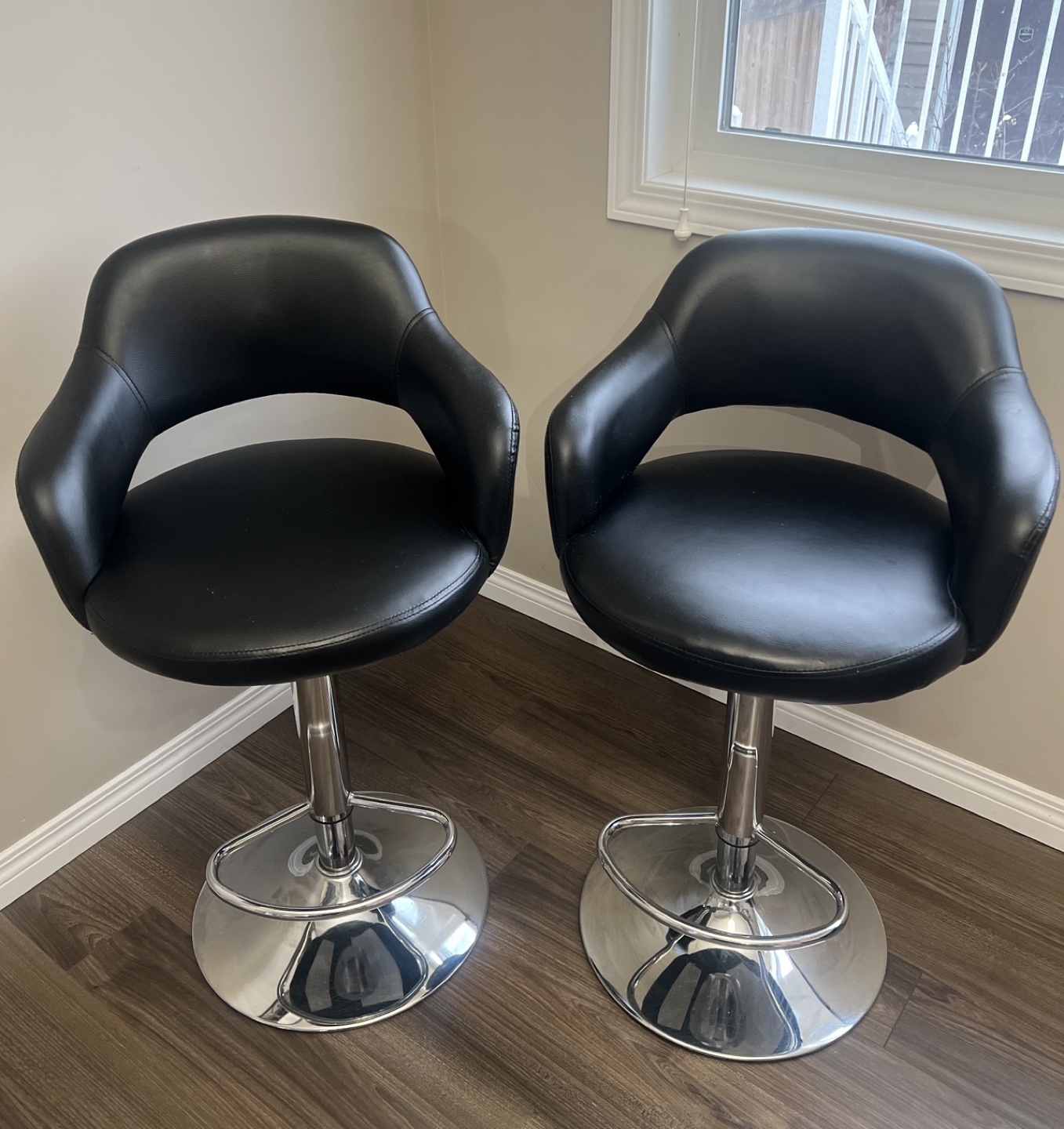 Set of Four Swivel Adjustable Black Leather Bar Stools