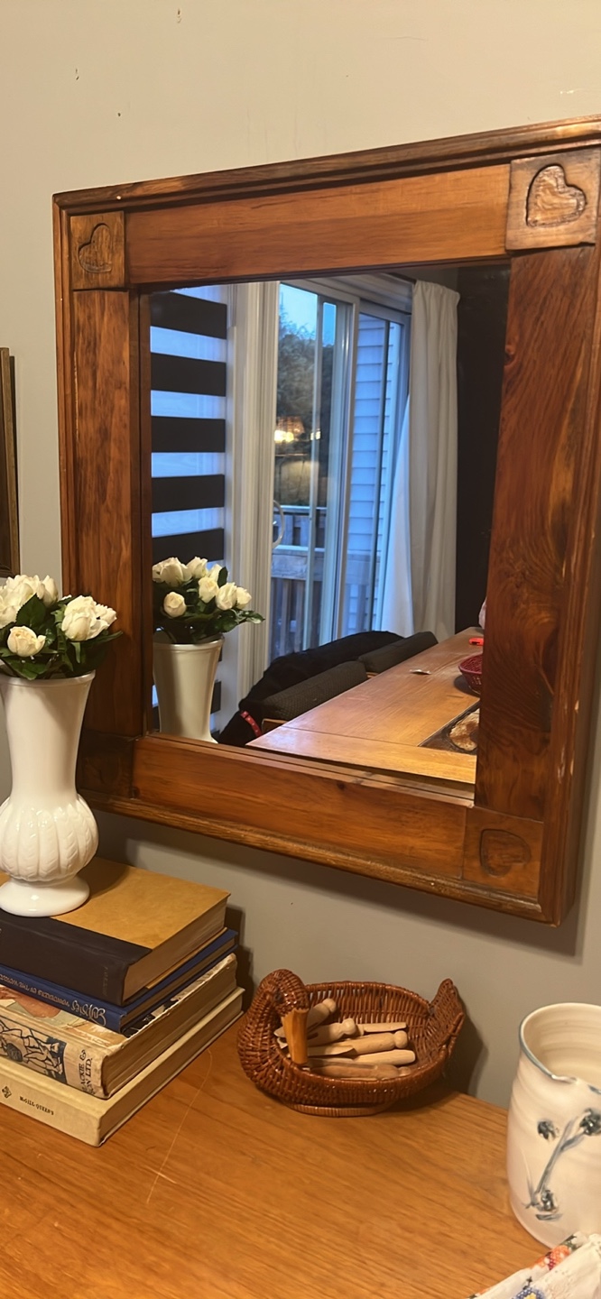 Wooden framed mirror with heart details