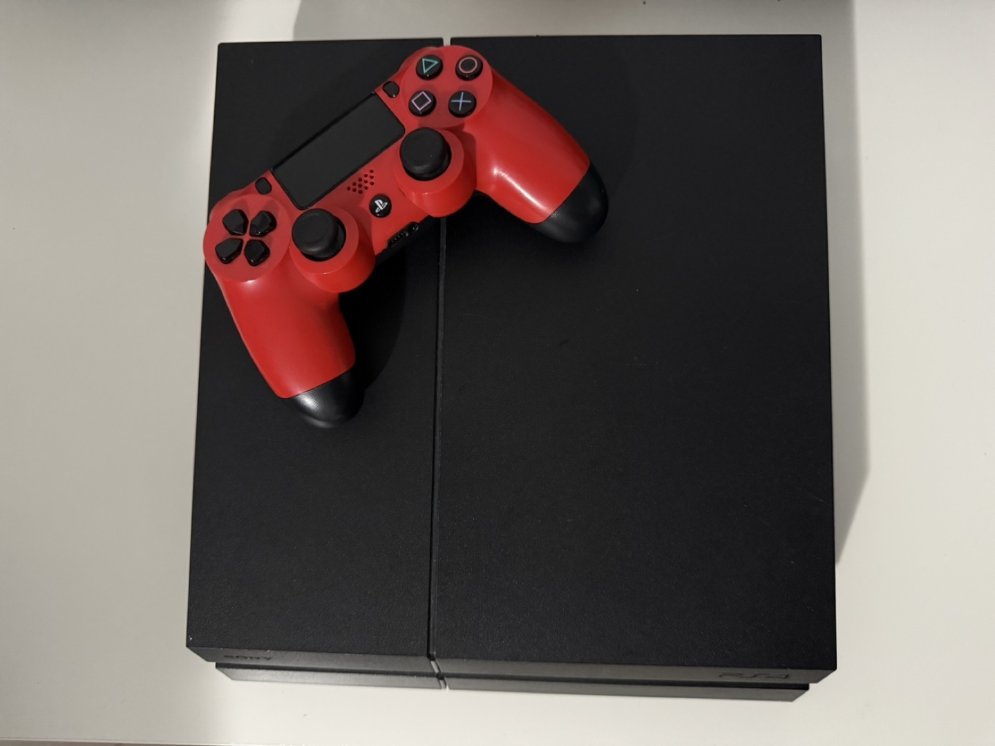 Sony PlayStation 4 Console with Red Controller