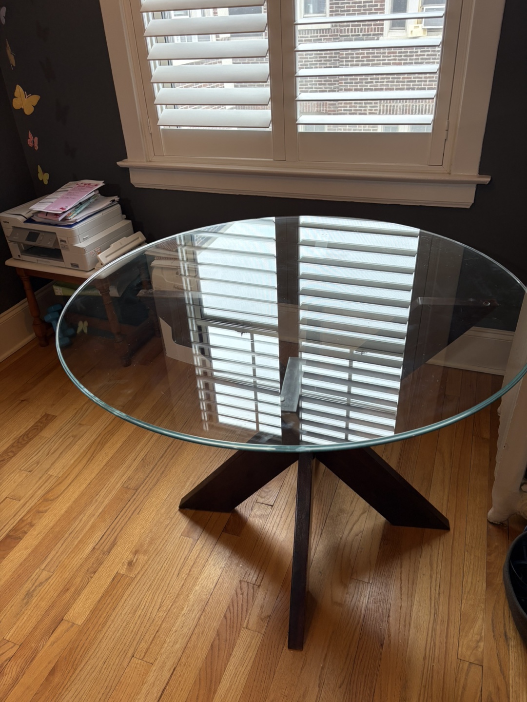 Round Glass Dining Table with Dark Wood Base