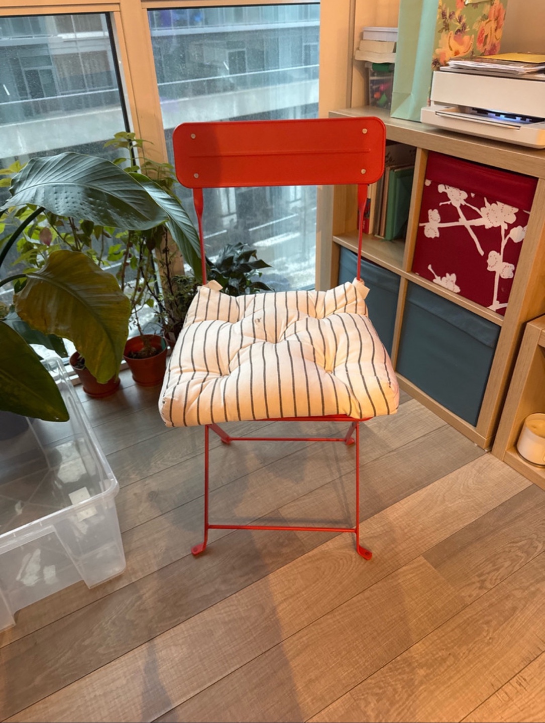 Red Metal Folding Chair with Striped Cushion