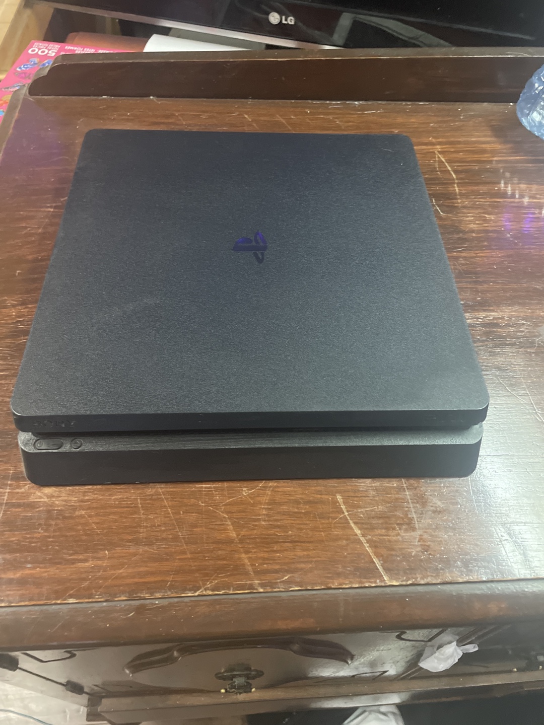 PS4 Slim Console with 4 Games