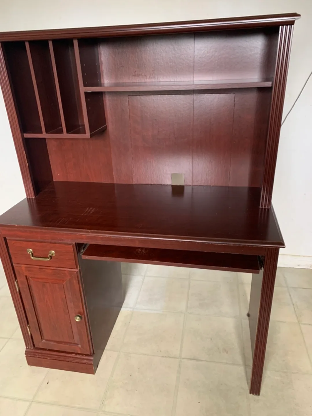 Cherry finish desk with drawer, keyboard surface, shelves. image indicator(5)