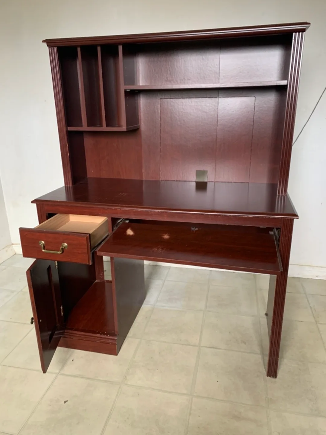 Cherry finish desk with drawer, keyboard surface, shelves. image indicator(3)
