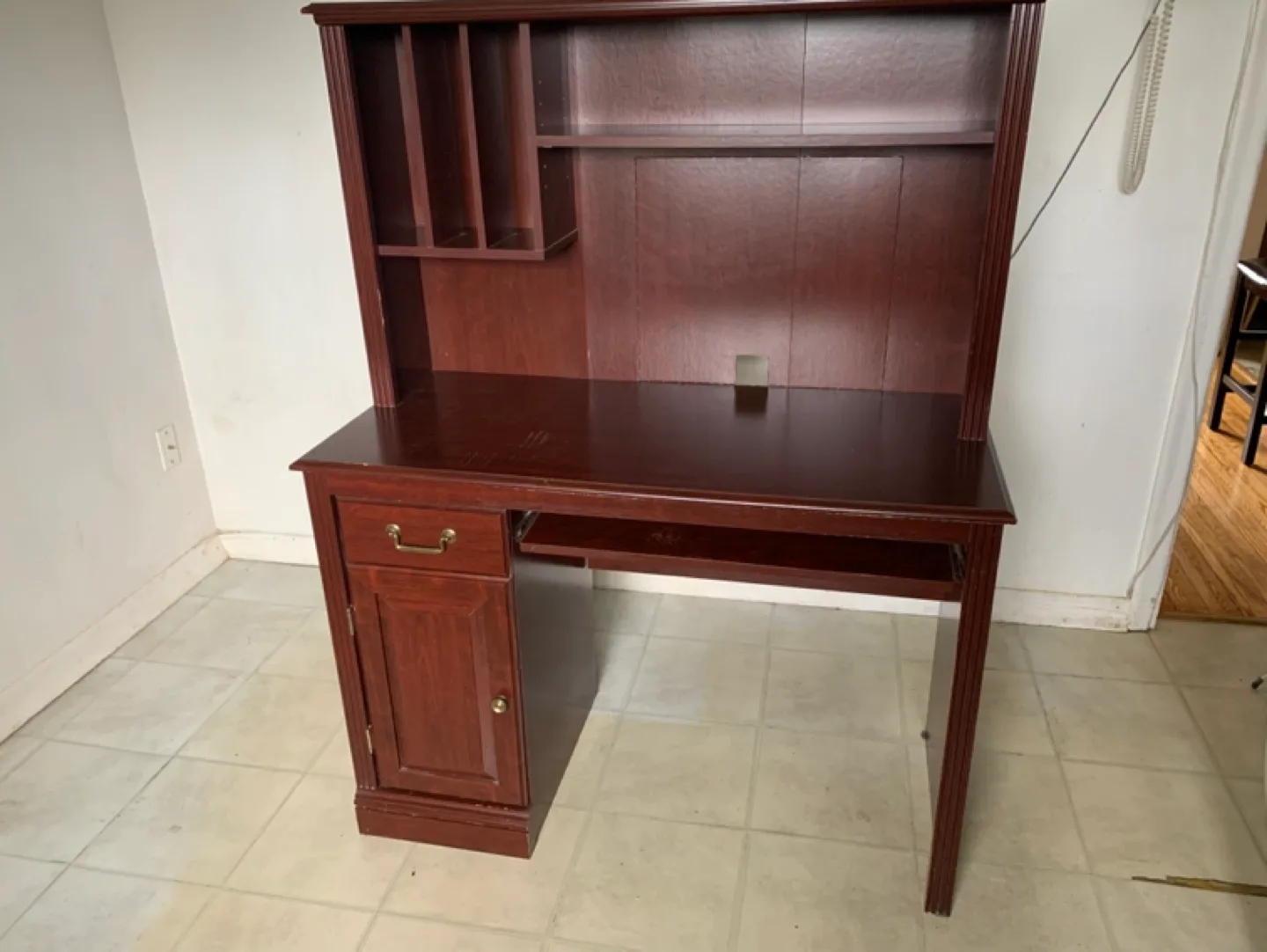 Cherry finish desk with drawer, keyboard surface, shelves. image indicator(6)