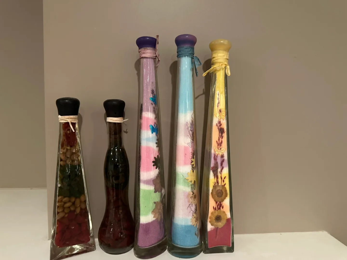 Set of decorative bottles with dried flowers thumbnail
