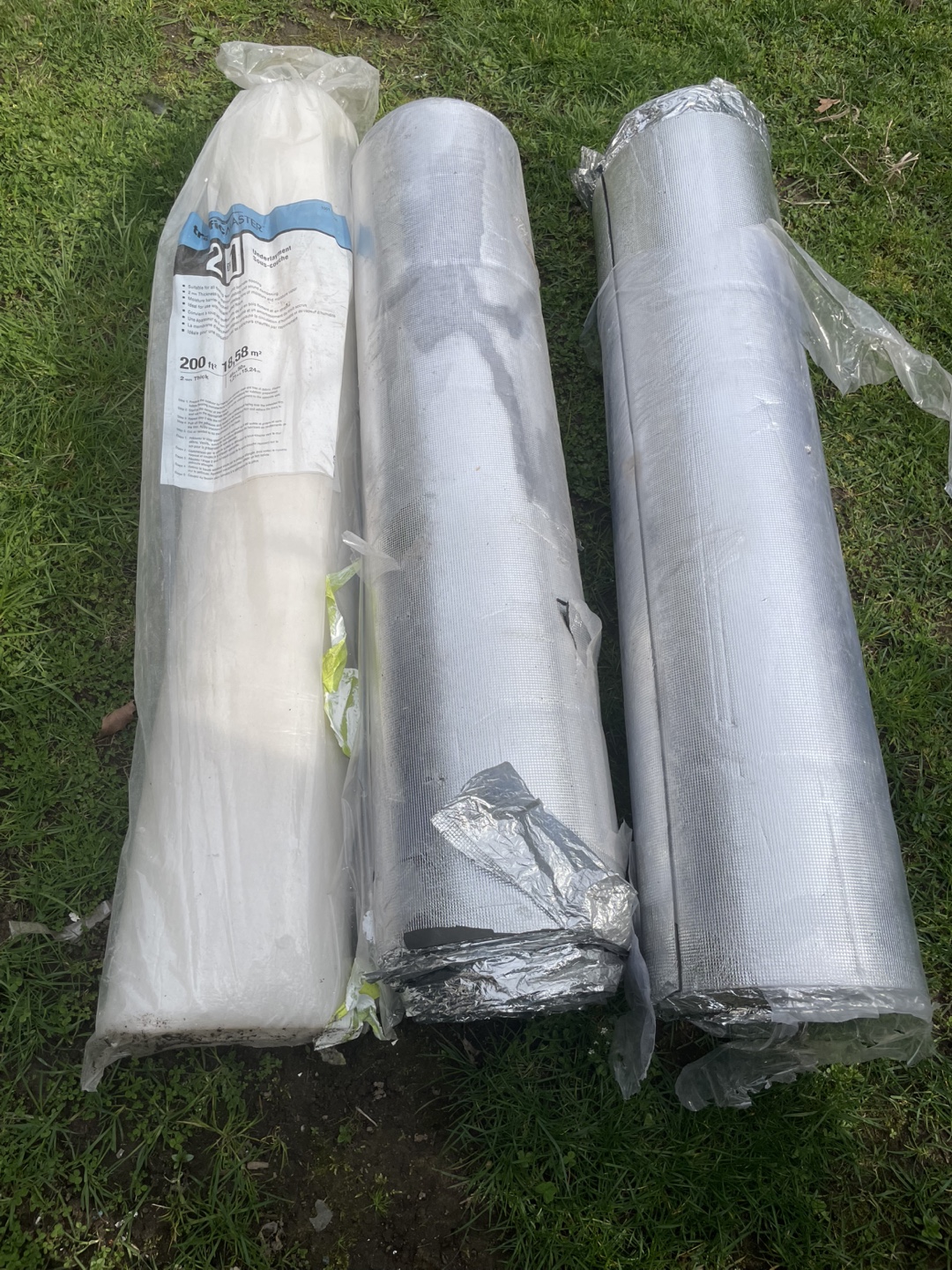Three rolls of underlay for laminate