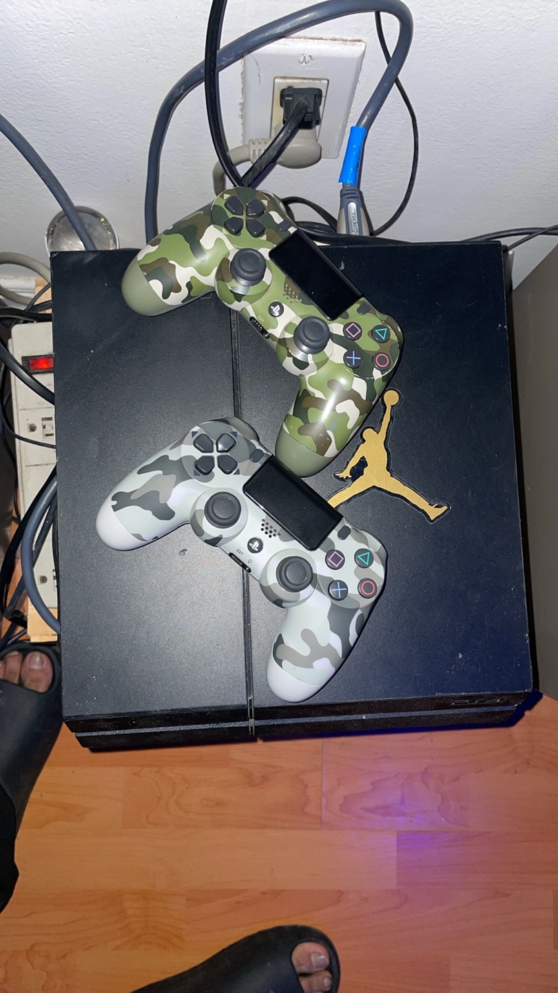 PS4 Console with 2 Camo Controllers & 8 Games