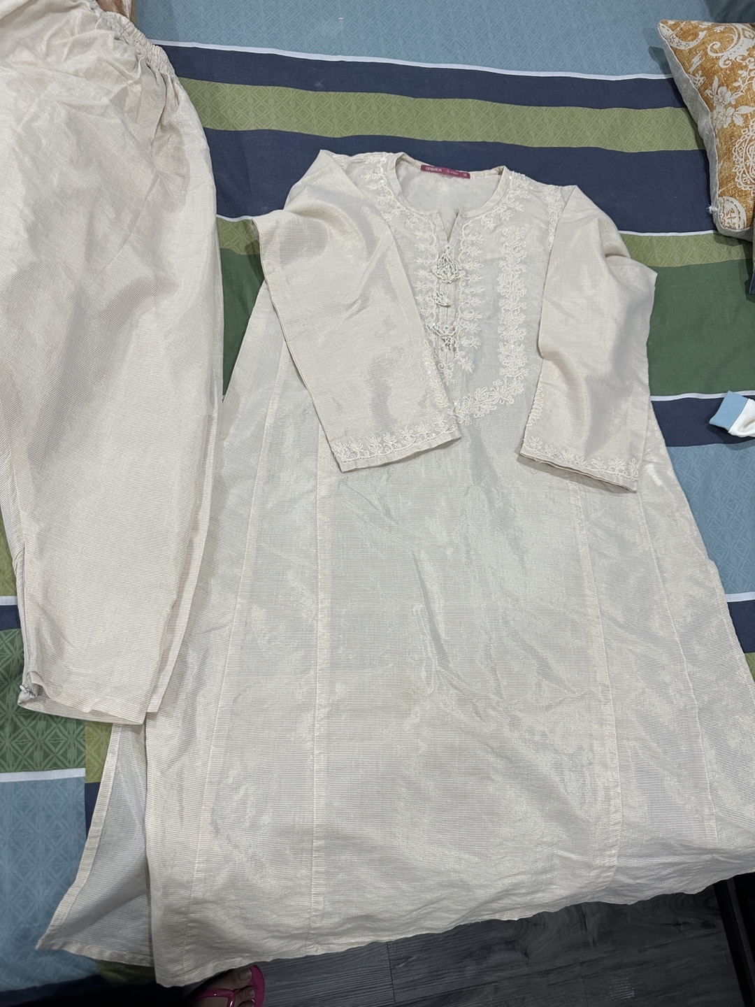 Cream-coloured embroidered kurta and pajama set