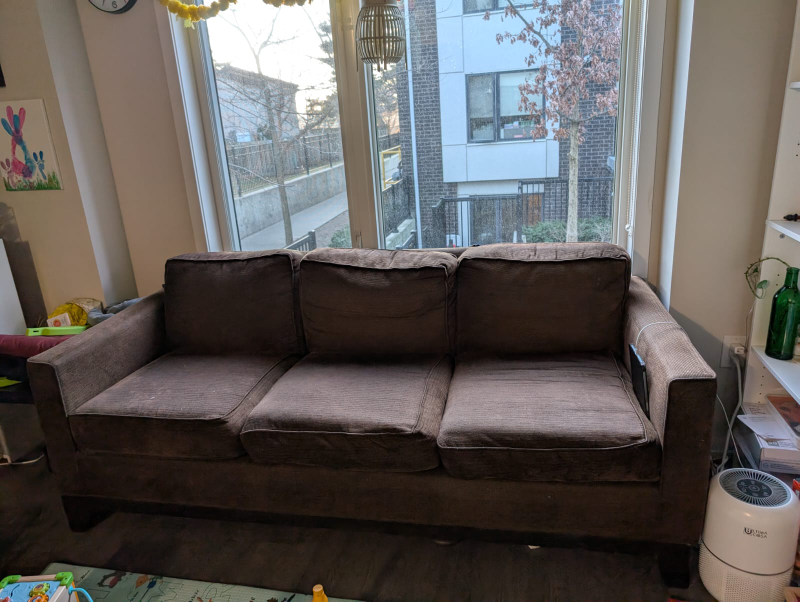 Brown corduroy three-seater sofa
