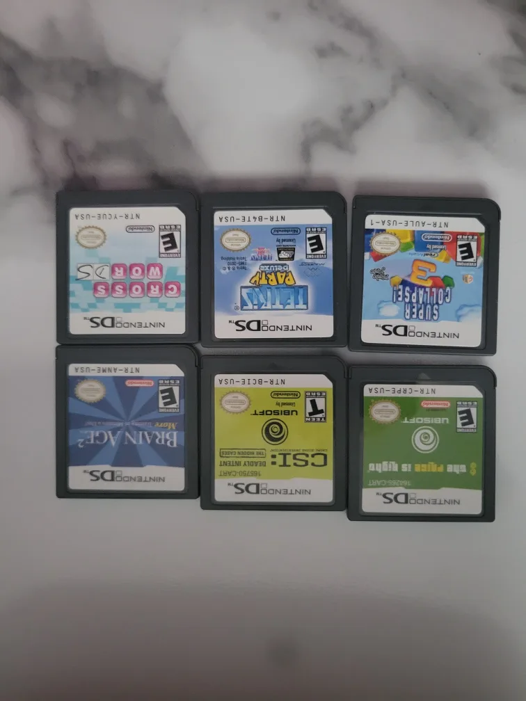 Nintendo DSi XL Console with Case and 6 games image indicator(6)