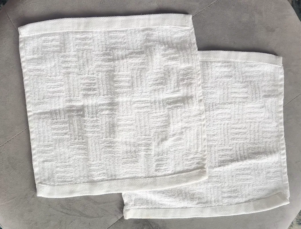 Trio of White Textured Washcloths image indicator(2)