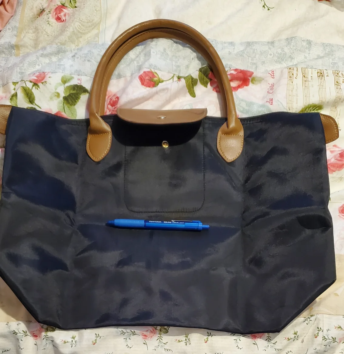 Foldable Black Nylon Tote Bag with Tan Leather Handles image indicator(2)