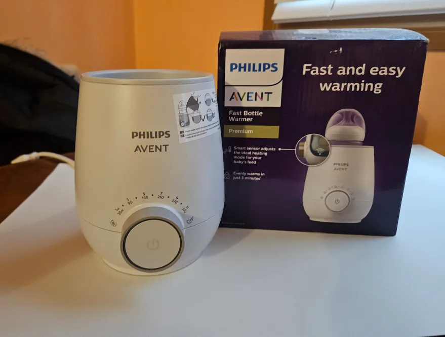 Breast Pump+Bottle Warmer + 5 Like New Bottles image indicator(3)