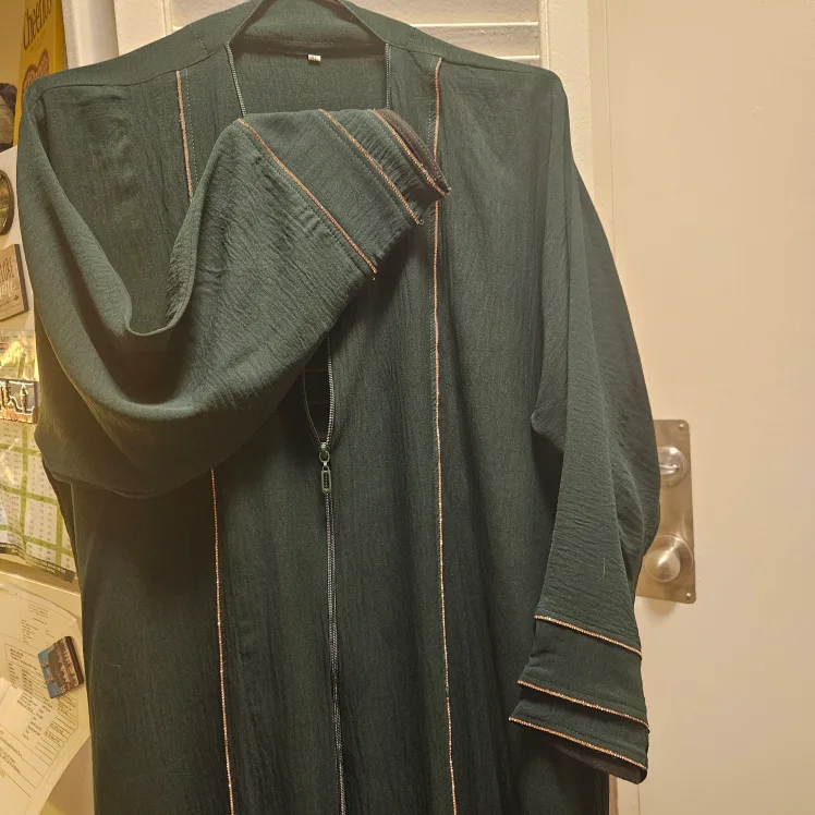 Elegant Emerald Green Abaya with Rose Gold Detailing image indicator(3)