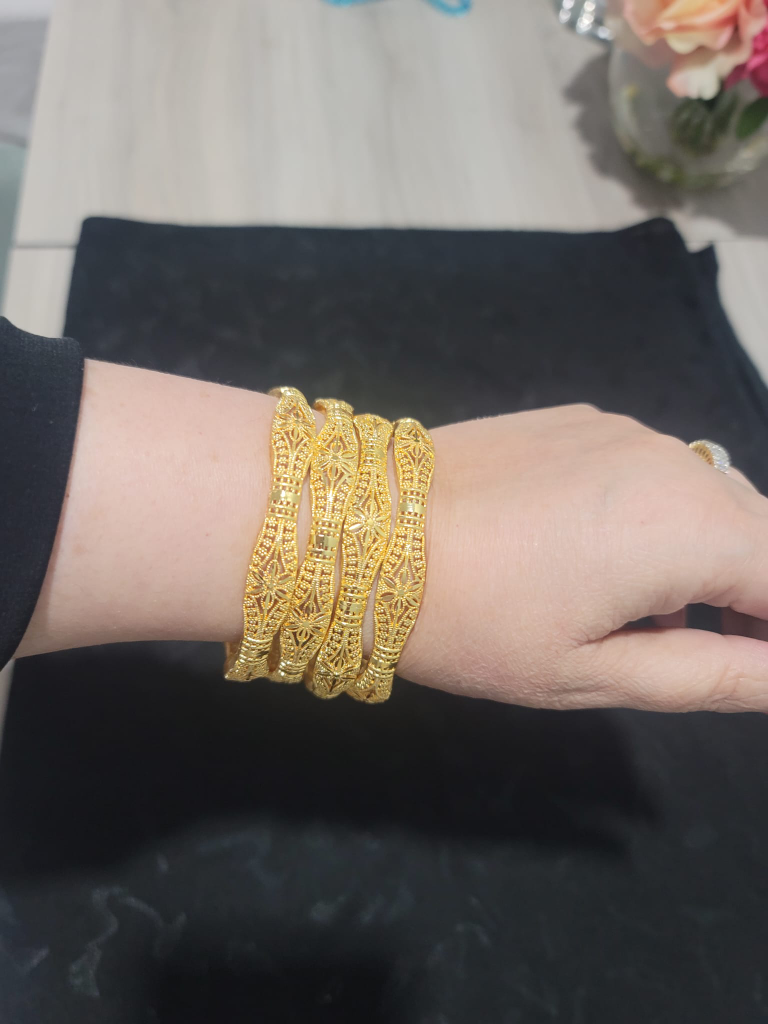 Gold-toned Bangles Set of Four - photo 3