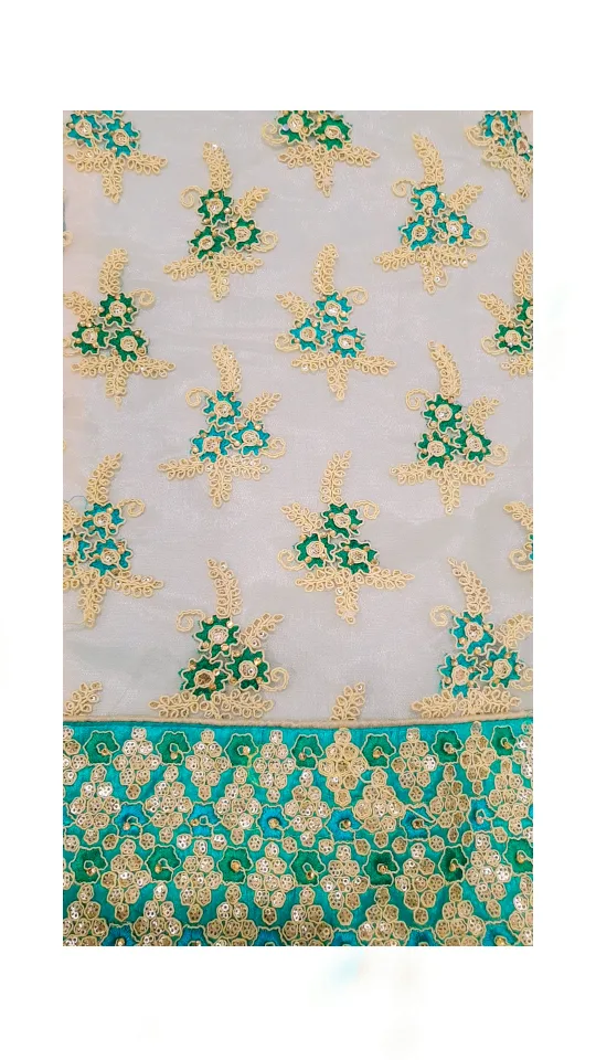 Beautiful teal and white embroidered saree image indicator(3)