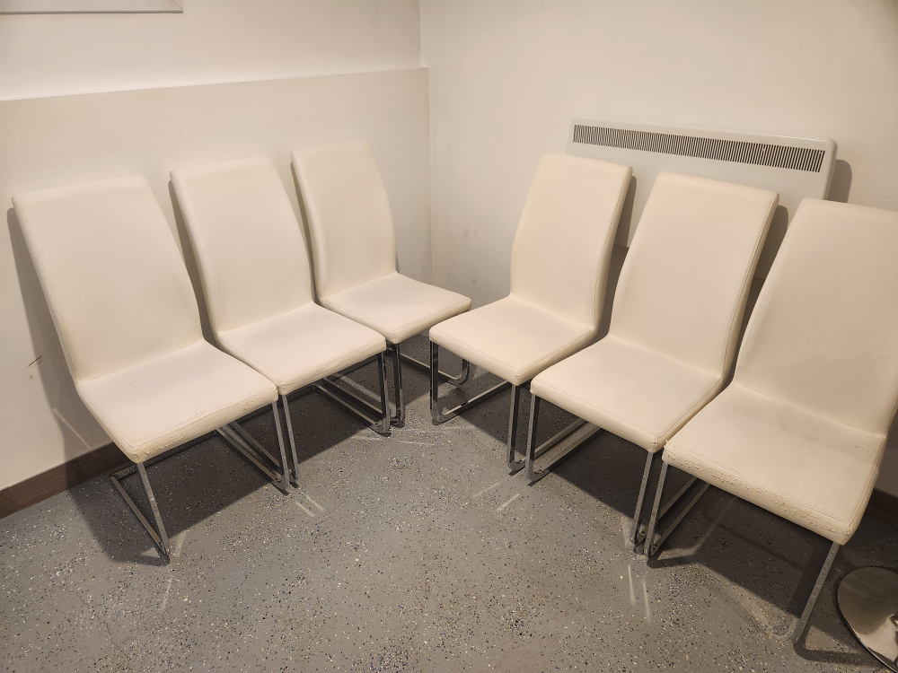 Six White Leather Dining Chairs with Chrome Legs